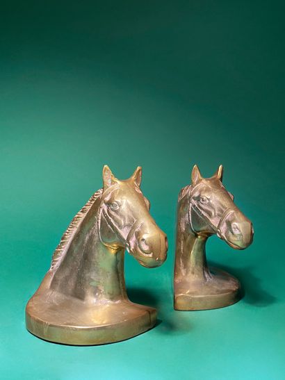 null In the style of the CHARLES HOUSE Equine heads Pair of bookends in weighted...