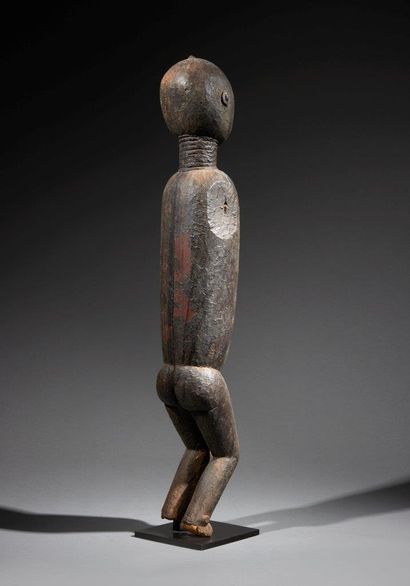 null Abron statue
Ivory Coast
Wood
H. 70 cm
Large Abron statue representing a hieratic...