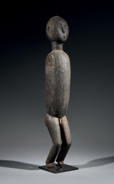 null Abron statue
Ivory Coast
Wood
H. 70 cm
Large Abron statue representing a hieratic...