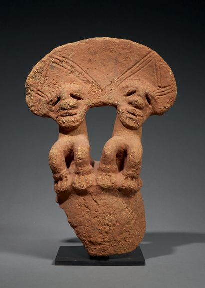 null Sokoto statue
Nigeria
5th century B.C. - 5th century A.D.
Terracotta
H. 33 cm
Provenance...