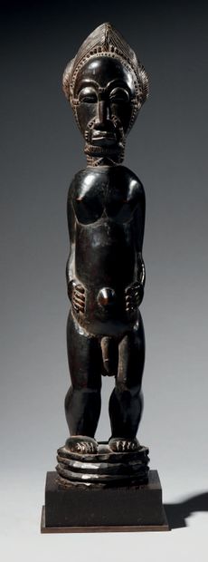 null Figure masculine Baoulé, Côte d'Ivoire
Bois
H. 43 cm
Debout, les pieds solidement...