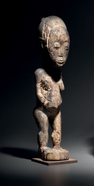 null Figure féminine Baoulé, Côte d'Ivoire
Bois à patine brune érodée
H. 31 cm
Provenance...
