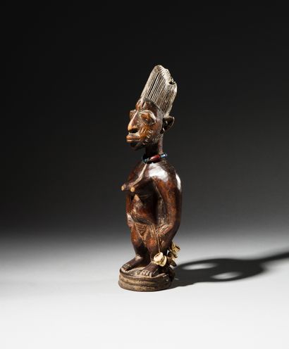null Statuette Ibeji Era, Yoruba, Nigeria
Wood and beads
H. 31 cm
Female Ibeji statuette...