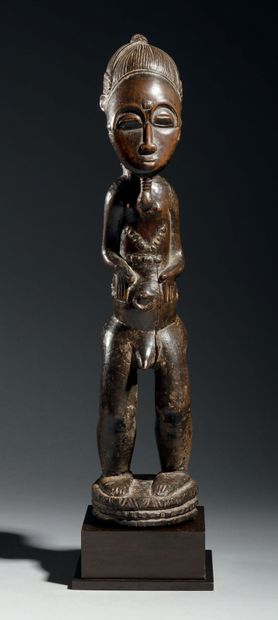 null Figure masculine Baoulé,
Côte d'Ivoire
Bois
H. 38 cm
Statuette Baoulé d'une...