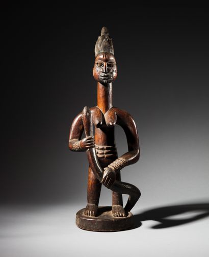 null Statue Yoruba, Nigéria
Bois, pigments
H. 68 cm
Provenance :
- Ancienne collection...