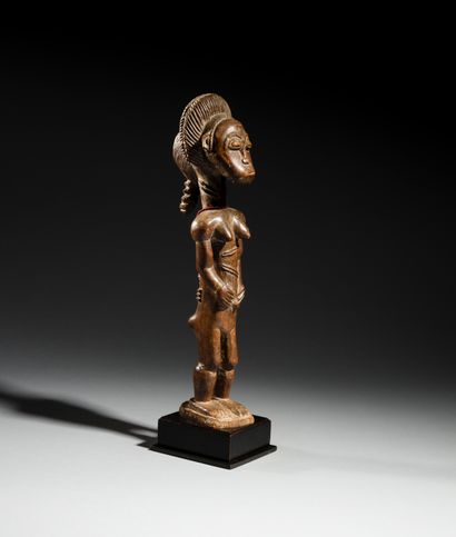 null Statue Blolo-bla Baoulé, Côte d'Ivoire
Bois et perles
H. 35 cm
Provenance :
-...