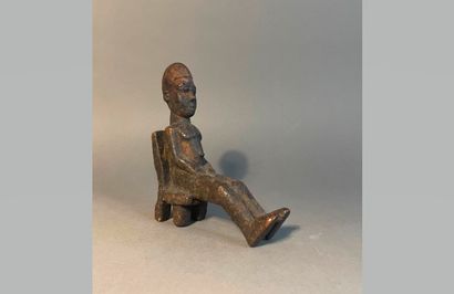 null 
Statue Lobi



Burkina Faso



Bois



H. 19 cm - L. 16 cm

Provenance :

-...