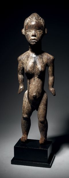 Female statuette known as Mano, Liberia
Wood...