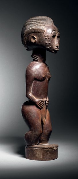 Baule male figure, Blolo Bian, Ivory Coast
Wood
H....