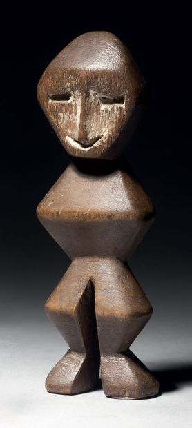 null Statuette Léga, Democratic Republic of the Congo
Wood, traces of kaolin
H. 14...