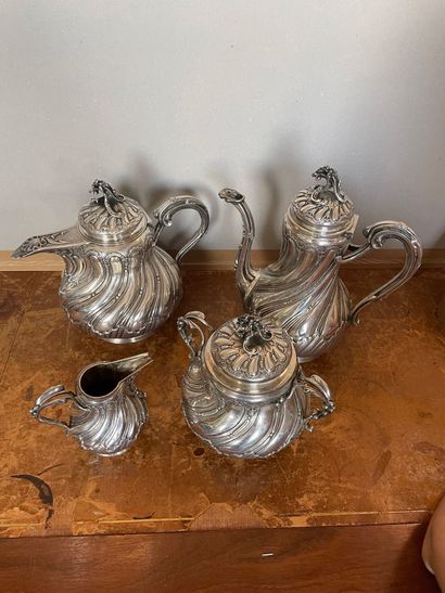 null Tea and coffee service
In silver 950°/°°
Including teapot, coffee pot, sugar...