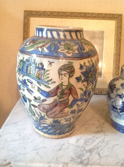 Deux vases balustre En céramique polychrome...