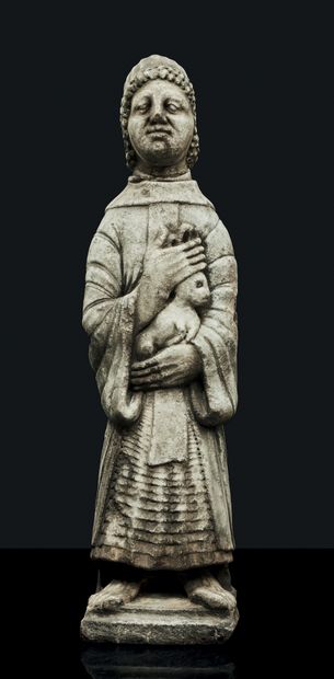 null Saint Marcoul en marbre sculpté, dos ébauché. Le saint ermite est coiffé d'un...