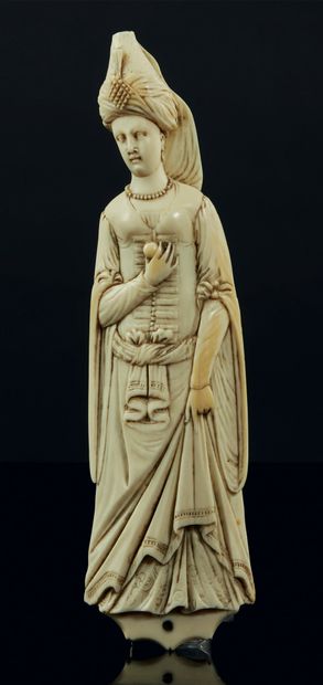 null 
Finely carved ivory tobacco rasp representing an oriental woman with a turbaned...