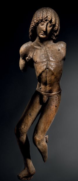 null Saint Sebastian in sculpted limewood. Naked body wearing a light belted loincloth,...