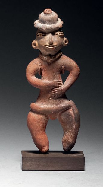 null 
Ɵ Tlatilco standing male figure wearing a hat, Mexico, buffware with traces...
