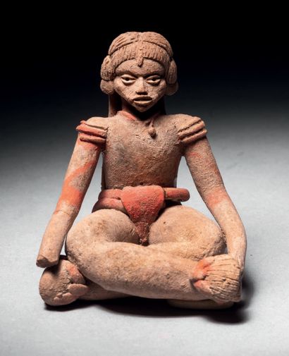 null 
Ɵ Xochipala figure sitting cross-legged, light grey ceramic with remains of...