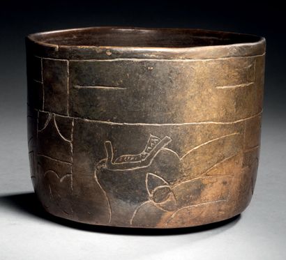 
Ɵ Olmec carved bowl with were-jaguar design,...
