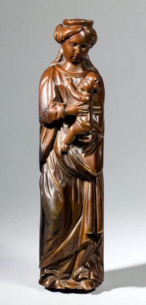null Importante Vierge à l'Enfant en bronze avec infimes traces de dorure, dos plat....