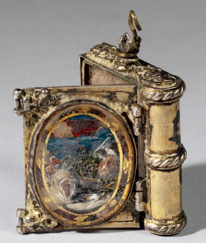 null Reliquary in gilded silver in the form of a book decorated on both sides with...