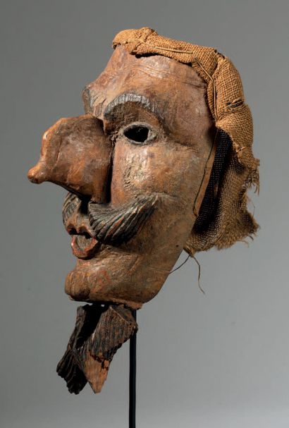 null Carnival mask made of hollowed out basswood, sculpted and polychromed with the...