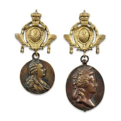 Pair of gilt bronze watchholders with the...