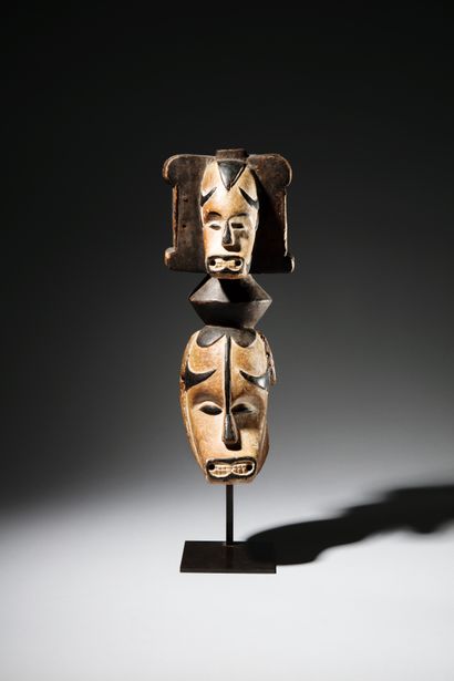 null IGBO MASK, NIGERIA
Wood
H. 46 cm
Igbo mask showing a human face with stylized...