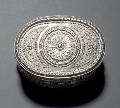 null Oval silver box chased on all sides with characters in medallions
Foreign work...