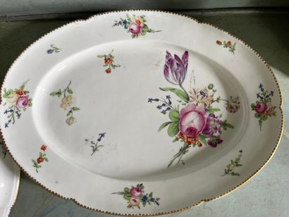 Paris Porcelain oval covered tureen and oval tray with polychrome decoration of bouquets...