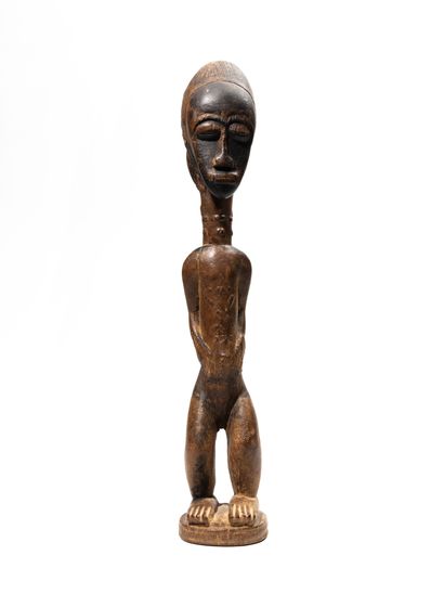 null Baule statue, Ivory Coast
Wood
H. 44 cm
Ancient statue representing a male figure...