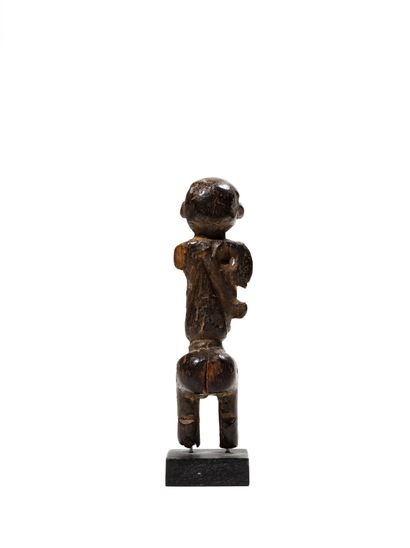 null Lobi statue, Burkina Faso
Wood
H. 13,5 cm
Small statue that probably served...