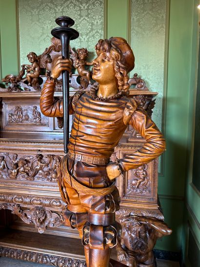 null Paire de torchères en bois sculpté et noirci représentant un maure et un vénitien...