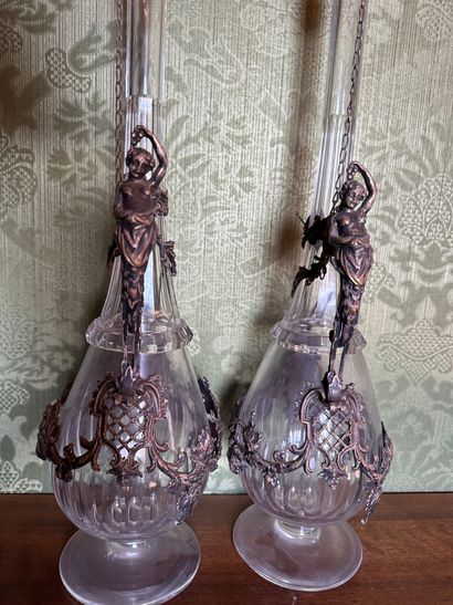 null Pair of carafes in cut crystal of baluster form with long neck.
Beautiful silver...