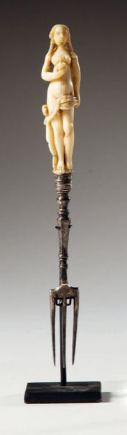Three-pronged fork with ivory handle representing...