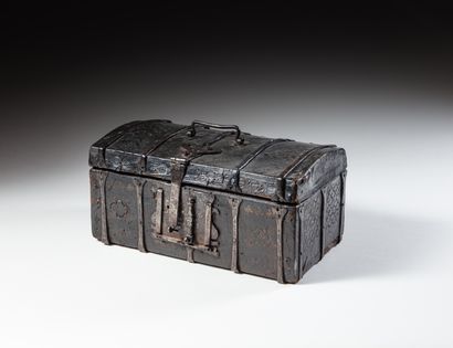 null Wooden case covered with chiseled leather decorated with scales, quatrefoils,...