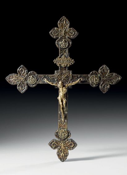 null Processional cross with wooden core covered with gilded and embossed copper...