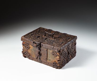 null Wooden box with rich decoration of iron rosettes, cut and forged, lock with...