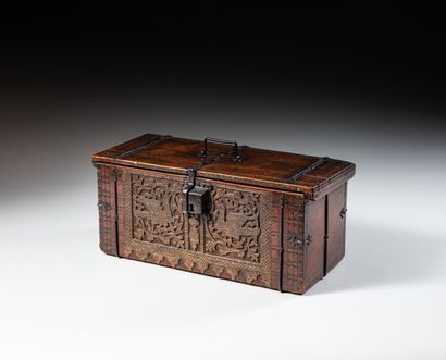 null Cypress box carved in flattened form with birds in foliage; case mounted with...