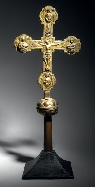 null Processional cross with wooden core covered with gilded and embossed copper....