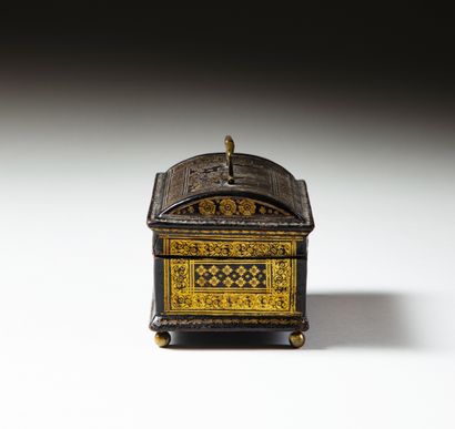 null Small wooden box covered with gilded leather, domed lid, top handle and brass...
