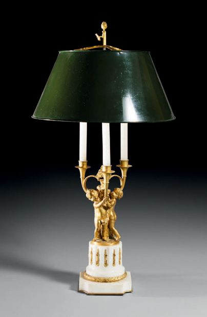 null Lamp called "bouillotte" in chased and gilded bronze. The marble column base...