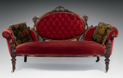 null Neo-Gothic style three-seater sofa in varnished, molded and carved wood, upholstered...