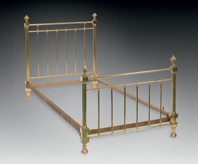 Two single beds in gilded metal with bars...