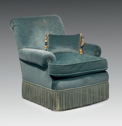Comfortable armchair covered with blue velvet,...
