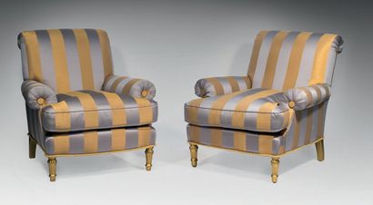 null Pair of comfortable armchairs covered with gilded and parma striped fabric,...