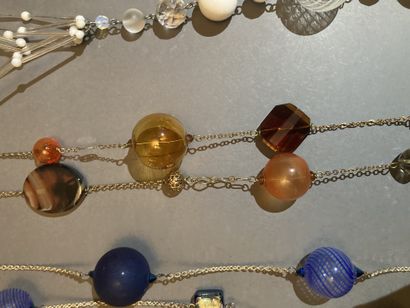 MURANO Lot of two necklaces and a necklace
In gilded metal and silver plated metal
Enhanced...