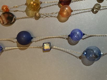 MURANO Lot of two necklaces and a necklace
In gilded metal and silver plated metal
Enhanced...