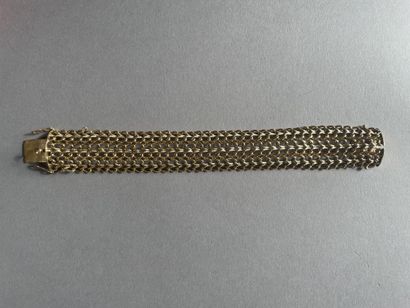 null Bracelet ruban à mailles anglaises
En or 750°/°°
Poids : 65,36 g