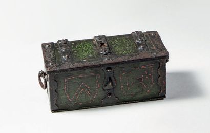 Polychrome wrought-iron case with red coat...