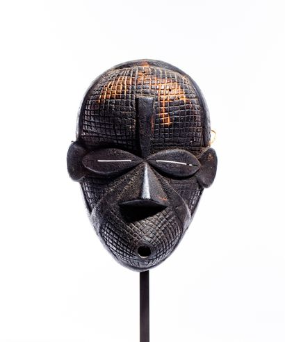 Masque de style Ibibio
Nigeria
Bois
H. 24,5...